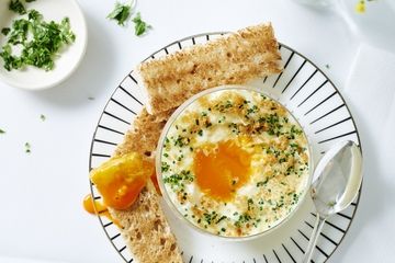 Eggs en cocotte with smoked haddock, leeks and chives